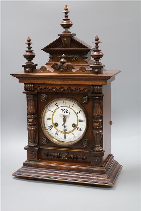 A walnut mantel clock height 56cm